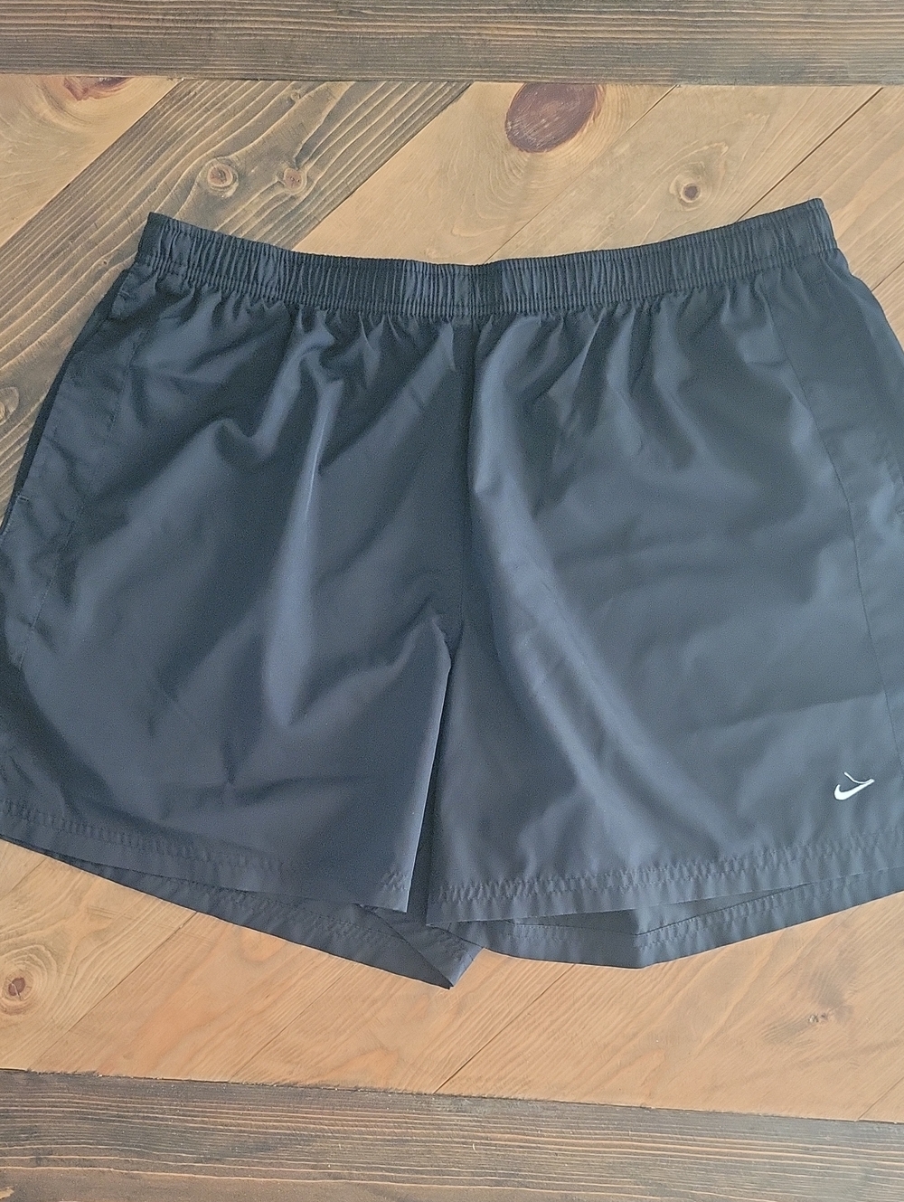 Nike Black Shorts with White Swoosh Detail